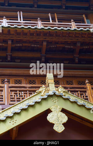 Closeup of Dafo Temple (also Big Buddha Temple) with facade, roof tiles and balconies, one of Guangzhou's most popular temples - Guangzhou, China