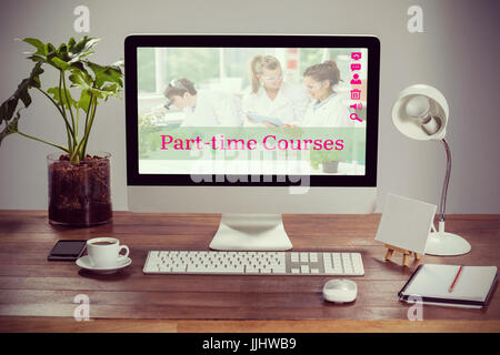 Composite image of part-time courses against computer with personal organizer and belongings Stock Photo