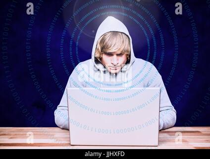 Blond hair hacker using a laptop in front of blue background Stock Photo