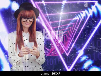 Smiling woman texting on purple interface Stock Photo