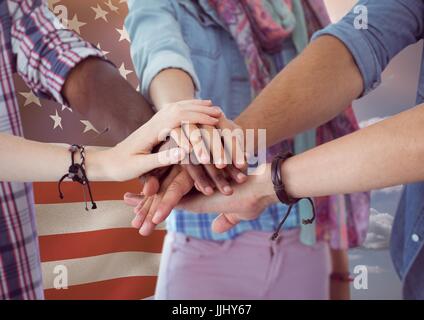 friends with hands together against american flag Stock Photo