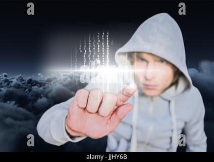 Hacker touching a digital screen with his finger Stock Photo