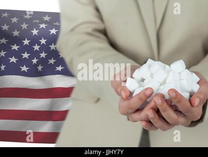 Man holding piece of paper in his hands against american flag Stock Photo