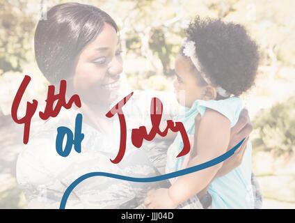 Mother holding her daughter for the 4th of July Stock Photo