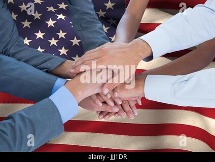 People putting their hands together on an american flag Stock Photo