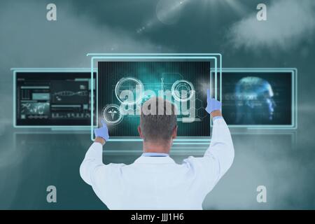 Man doctor interacting with 3d medical interfaces against sky with clouds Stock Photo
