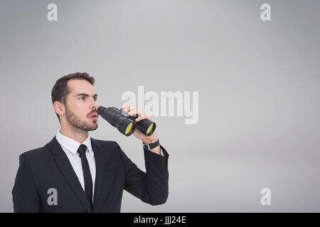 Confused man with binoculars against white copy space background Stock Photo