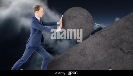 Man pushing 3D rolling round rock Stock Photo