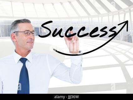Happy senior businessman writing on the screen SUCCESS (+arrow). He is in the office Stock Photo