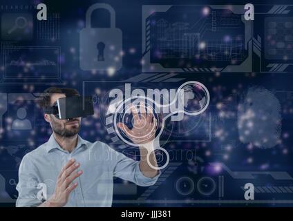 Man in VR headset touching interface against purple interface background Stock Photo