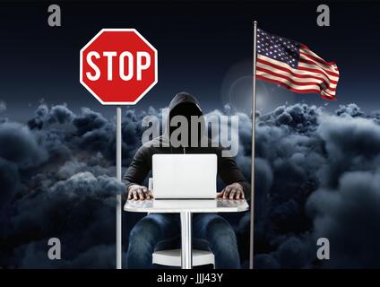 Hacker working on laptop near to 3D american flag and stop board with cloudy background Stock Photo