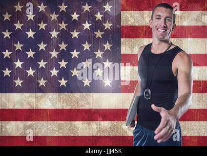 Sport coach shaking his hand against american flag Stock Photo