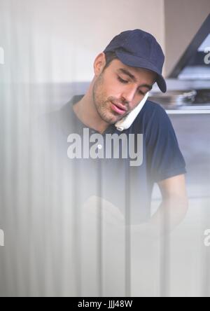 Delivery Courier on phone with transition effect and copy space Stock Photo