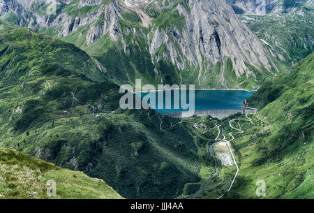 Lake of Morasco in a summer afternoon in the Formazza Valley with sunny light and shadow Stock Photo