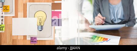 Business woman mid section with tablet and sticky notes transition Stock Photo