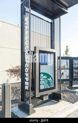 Starbucks drive-thru ordering stand Stock Photo