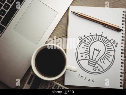 Idea doodle on notepad with pen next to laptop and coffee Stock Photo