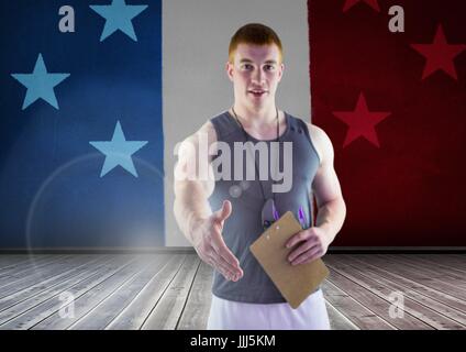 Sport coach shaking his hand against american flag Stock Photo