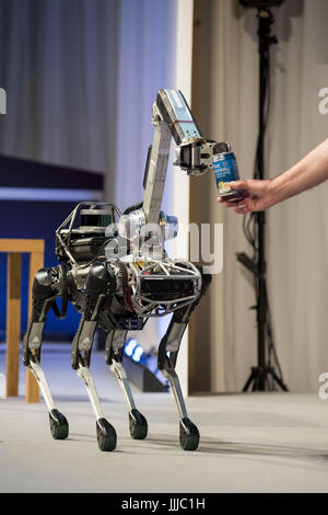 Tokyo, Tokyo, Japan. 20th July, 2017. Boston Dynamics CEO and Founder Marc Raibert (R) demonstrates his company's SpotMini robot at SoftBank World 2017 conference in Tokyo, Japan. Credit: Alessandro Di Ciommo/ZUMA Wire/Alamy Live News Stock Photo