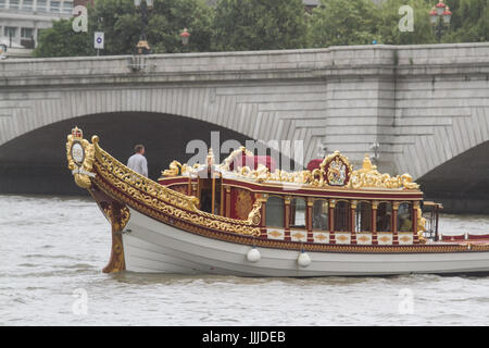 London, UK. 20th July, 2017. The rowbarge Gloriana used for Queen Elizabeth II Diamond Jubilee navigates on the River Thames in Putney on an overcast day Credit: amer ghazzal/Alamy Live News Stock Photo