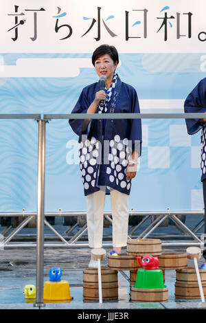 Tokyo, Japan. 20th July, 2017. Tokyo Governor Yuriko Koike speaks during the Uchimizu-Biyori event outside the Tokyo Metropolitan Building on July 20, 2017, Tokyo, Japan. Uchimizu is a Japanese summer tradition of wetting down the streets by sprinkling water to keep down dust and cool pavements to reduce the temperature. Credit: Rodrigo Reyes Marin/AFLO/Alamy Live News Stock Photo