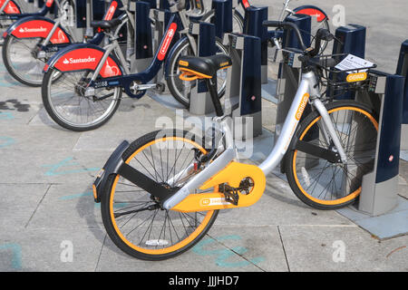 London, UK. 20th Jul, 2017. New cycle hire Obikes create confusion on the streets of London. People have been abandoning the new bikes in incongruous and inconvenient places. One of the those bikes is seen at a 'Boris Bike' docking station Credit: Zefrog/Alamy Live News Stock Photo