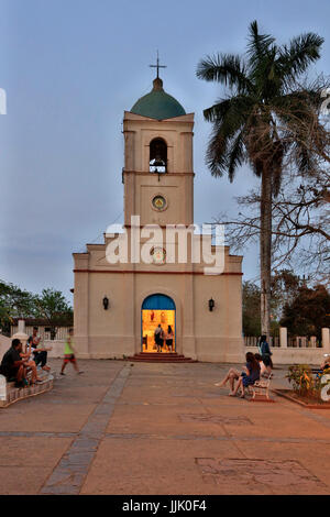 Sunset in the plaza in front of the local church - VINALES, PINAR DEL RIO, CUBA Stock Photo