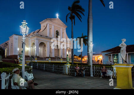 The IGLESIA PARROQUIAL DE LA SANTISIMA TRINIDAD is located on PLAZA MAYOR - TRINIDAD, CUBA Stock Photo