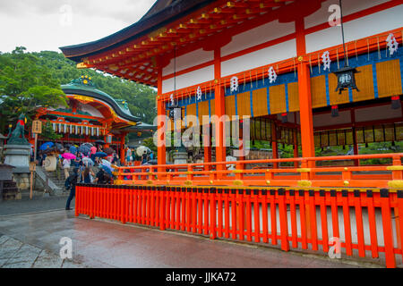 KYOTO, JAPAN - JULY 05, 2017: Fushimi inari temple at rainy day in Kyoto, Japan Stock Photo
