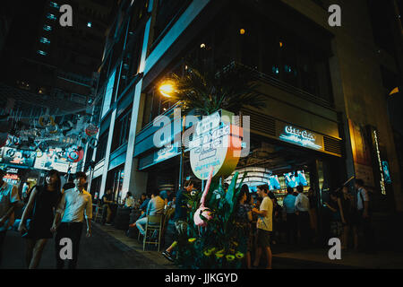 July 14, 2017, Lan Kwai Fong, Hong Kong, China : Business people meet at bar on happy hour Stock Photo