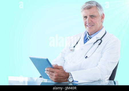 Composite 3d image of portrait of confident male doctor using digital tablet Stock Photo