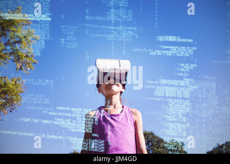 Girl using vr 3d headset in the park Stock Photo