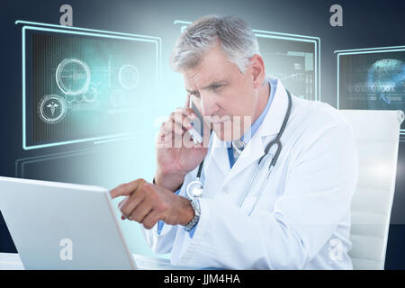 Composite 3d image of male doctor pointing at laptop while using mobile phone Stock Photo