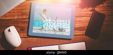 Composite 3d image of businessman learning on the beach Stock Photo