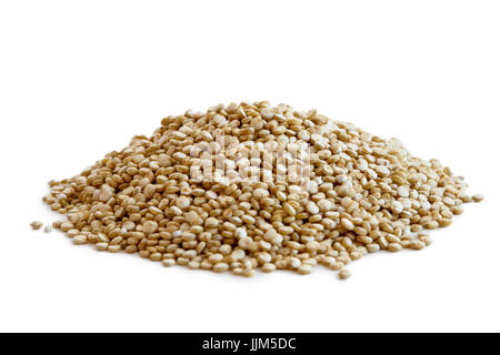 Heap of quinoa seeds isolated on white. Stock Photo