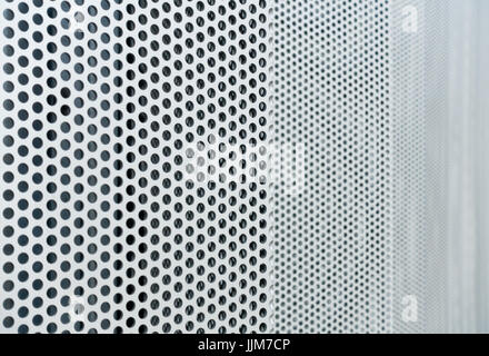 Gray metal background, round perforated metal texture Stock Photo