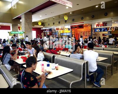 TAYTAY CITY, PHILIPPINES - JULY 15, 2017: A food court inside the SM City mall in Taytay City, Philippines. Stock Photo