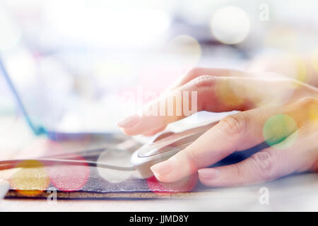 Computer networking,using computer double exposure and blurred view of car on street at night Stock Photo