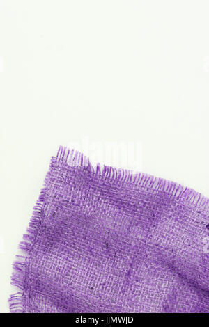 A piece of old burlap, isolated on a white background. Stock Photo