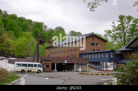 Tohoku, Japan - May 17, 2017. Wooden cottage at Tamagawa Hot Spring in Tohoku, Japan. Tamagawa is located in a valley about 12 km west of the peak of  Stock Photo