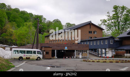 Tohoku, Japan - May 17, 2017. Wooden cottage at Tamagawa Hot Spring in Tohoku, Japan. Tamagawa is located in a valley about 12 km west of the peak of  Stock Photo