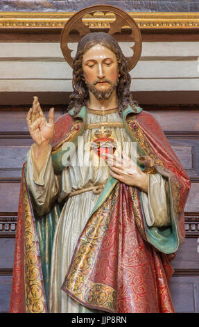 BANSKA STIAVNICA, SLOVAKIA - FEBRUARY 5, 2015: The carved and polychrome statue of heart of Jesus Christ in parish church by unknown artist of 19. cen Stock Photo