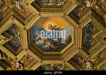 ROME, ITALY interiors and architectural details of the Basilica of Santa Maria in Trastevere in Rome, Italy. Octagonal ceiling painting Assumption of  Stock Photo