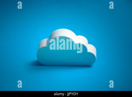 White cloud shape over blue background Stock Photo