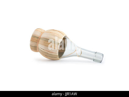 Empty glass bottle lying on white surface. Isolated with clipping path Stock Photo