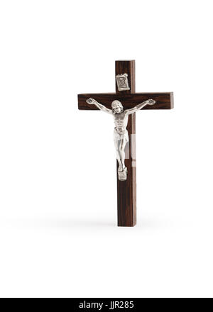 Small wooden crucifix standing on white background. Isolated with clipping path Stock Photo