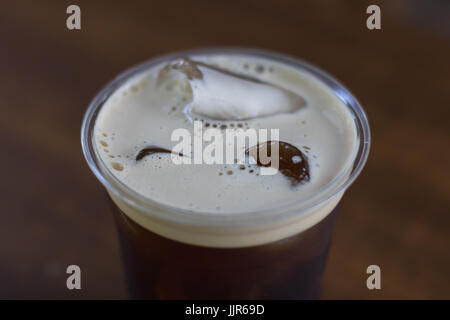 Sparkling Nitro cold brew coffee in take away cup ready to drink Stock Photo