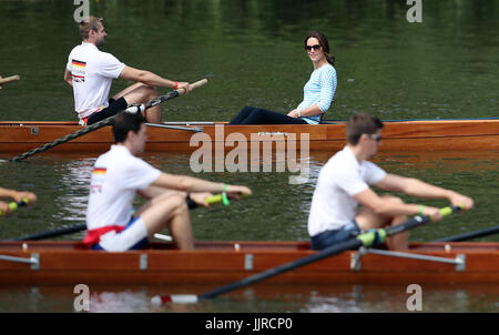 Duchess of Cambridge takes part in a rowing competition on the River Neckar during their visit to Heidelberg on the second day of their three-day tour of Germany. Stock Photo