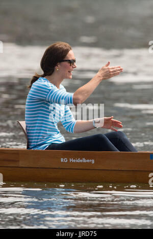 The Duchess of Cambridge takes part in a rowing race between teams representing the twinned towns of Heidelberg and Cambridge in Heidelberg, Germany, on day three of their five-day tour of Poland and Germany. Stock Photo