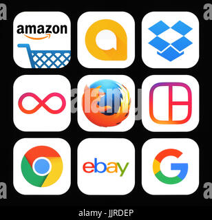 Kiev, Ukraine - November 26, 2016: Collection of popular social media icons printed on black paper: Amazon, Google Allo, Dropbox, Instagram Boomerang, Stock Photo